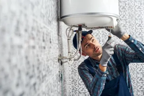 Tech repairing boiler in Monroe Township, NJ