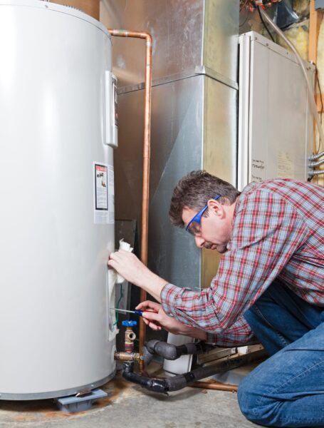 Water heater maintenance by the technician in Monroe Township, NJ.